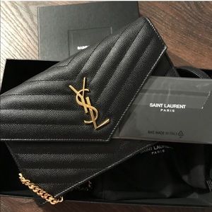Black YSL wallet on a chain